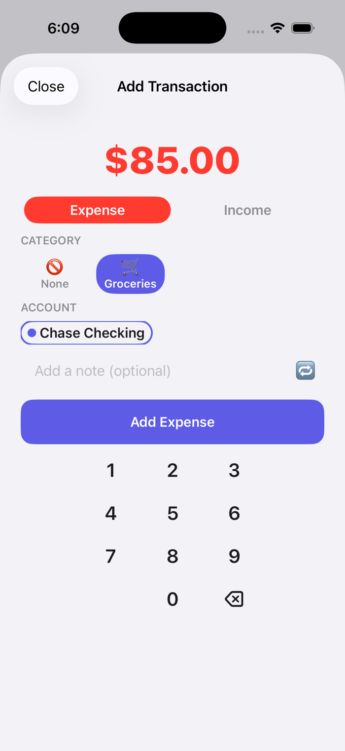 Add Transaction screen with the custom numpad open and Groceries category selected